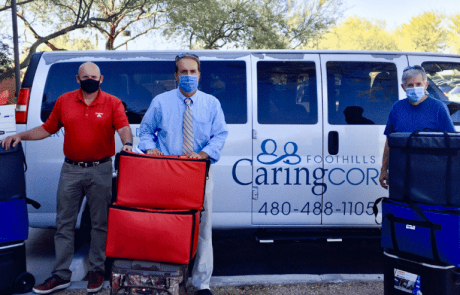 Loading Caring Corps Van