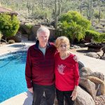 Ken and Ann in front of their new pool